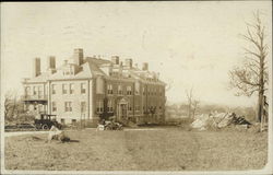 Two Cars Driving to Large Building Postcard