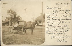 Woman and Child in a Buggy with a Horse Postcard