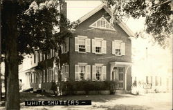 Brick House with White Shutters Buildings Postcard Postcard Postcard