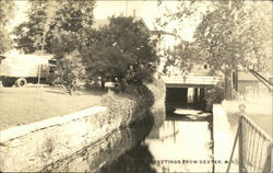 View of River Canal Through Town Dexter, NY Postcard Postcard Postcard