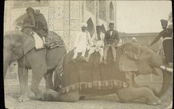 Men in Native Clothing, Riding Elephants Postcard