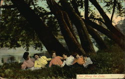 Six ladies reclining in the grass under some trees Women Postcard Postcard Postcard