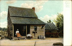 Typical Negro Home and Residents Postcard