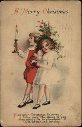 A Merry Christmas - Young Girl and Boy Holding Candle and Flowers Children Postcard Postcard Postcard