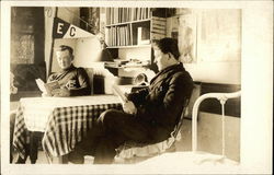 Two Young Men Reading at a Table at a E Town College Postcard