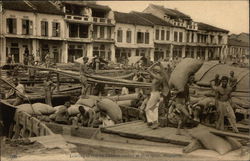 Landing of Rice by Chinese Coolies at Boat Quay Postcard