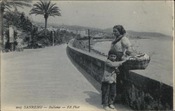 Woman and Child by Seawall Postcard