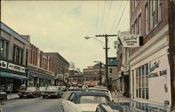 Looking up High Street Postcard