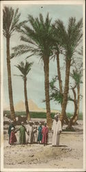 Man and Children Standing in Front of the Pyramids Cairo, Egypt Africa Postcard Postcard