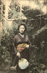 Japanese Woman in a Garden Postcard Postcard