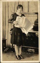 Woman In Dark Dress Plays The Accordion Postcard