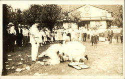 People Gathering Around Men Kneeling Postcard