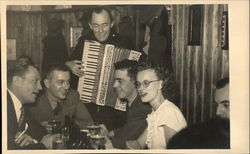 Enjoying a Drink Being Serenaded by Musician Postcard