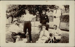 Snapshot of Family Posing With Farm Implements Postcard Postcard Postcard