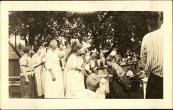 A Group of Women Playing Instruments Postcard