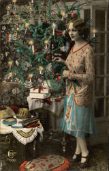 Woman with Christmas Tree Postcard