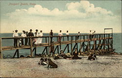 People on Beach and Pier Postcard