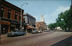 Looking Up Main Street Towards Opera House and the Rogers Hotel Postcard