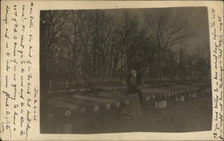 Woman Standing Near Cannon Barrels Davenport, IA Postcard Postcard Postcard