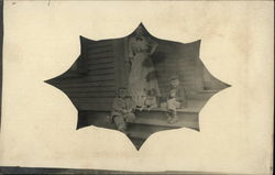 Mother Posing on Porch with Children and Dog Postcard