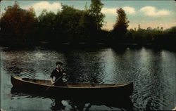 Woman in Canoe on Water Postcard