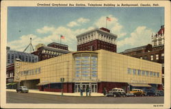 Overland Greyhound Bus Station, Telephone Building in Background Postcard