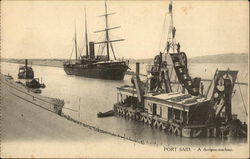 Suez Canal and Dredging Machine Port Said, Egypt Africa Postcard Postcard