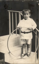 Boy Standing on Steps With Hoop Postcard