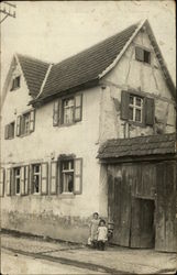 Two Children in Front of Home Eighstetten, Germany Postcard Postcard Postcard