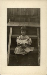 Edith B. Holding Chicken on Stairs Postcard