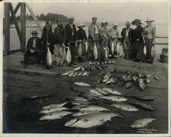 Group of People with Fish on Dock Capitola California