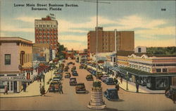 Lower Main Street Business Section Postcard