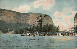 Chas. Nelson Making Canoe Mile Record Postcard