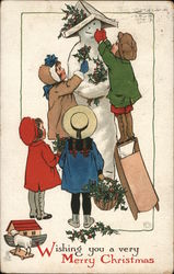 4 Children Building a Snowman Postcard Postcard