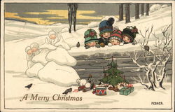 "A Merry Christmas" - Children Peek Over Wall At Tree and Toys in Snow Postcard