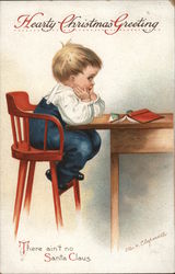 Small Boy on a Chair at a Desk - "There Ain't No Santa Claus" Children Ellen Clapsaddle Postcard Postcard Postcard