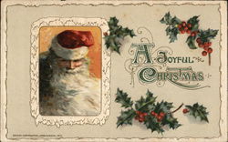 "A Joyful Christmas" - Mistletoe and Inset of Santa's Face Santa Claus Postcard Postcard Postcard