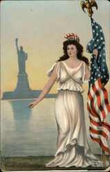 Women in White Dress Holding American Flag in fromt of the Statue of Liberty Patriotic Postcard Postcard