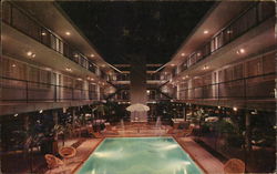 The DeVille Motor Hotel Postcard