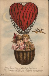 Boy and Girl in Heart-Shaped Balloon Basket Postcard