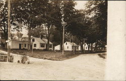 View of Crossroads in Town Postcard