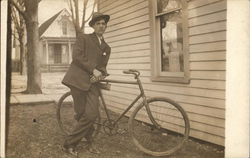 Man Leaning On Old Bicycle Postcard