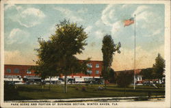 Park Scene and Portion fo Business Section Postcard