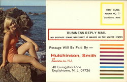 Girl Sitting on Beach Rocks Postcard