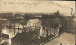 3rd street Looking West of Flooded Town Disasters Postcard Postcard Postcard