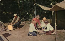 Family Setting Up Camp Postcard