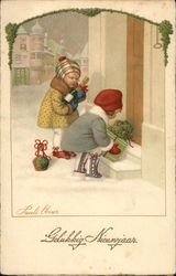 2 children placing gifts on door steps Postcard