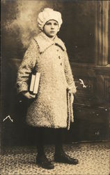 Portrait of Child Carrying Books Postcard