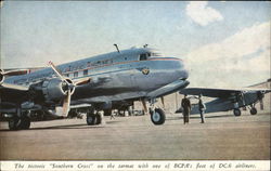 The Historic Southern Cross on the Tarmac with One of BCPA's DC-6's Aircraft Postcard Postcard Postcard