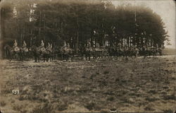 Soldiers on Horses Pulling Cart Postcard